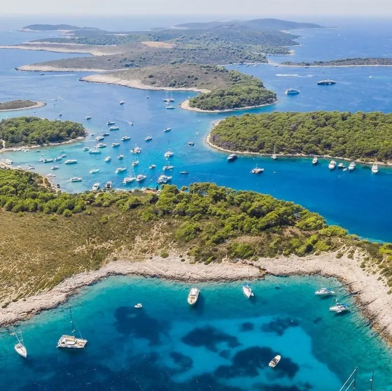 Pakleni islands near Island Hvar in Croatia, surrounded with sailing and motor boats