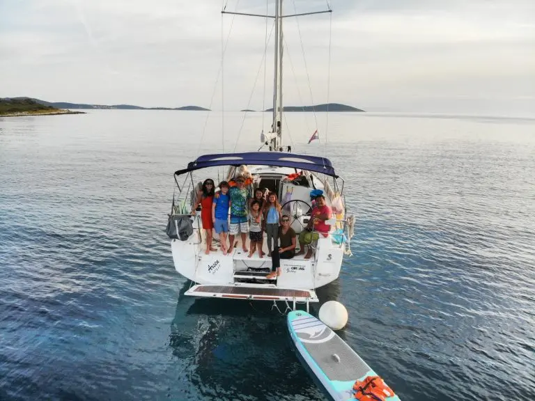 Family on the deck of the sailboat on their Croatia bareboat charter
