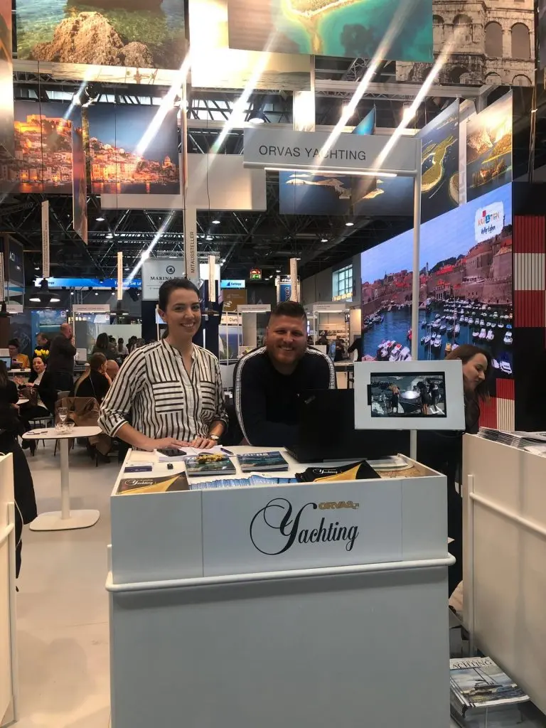 Orvas Yachting stand with two representatives at Boot Dusseldorf