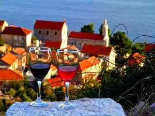 Glasses of wine and beautiful view on Hvar - Orvas Yachting Croatia