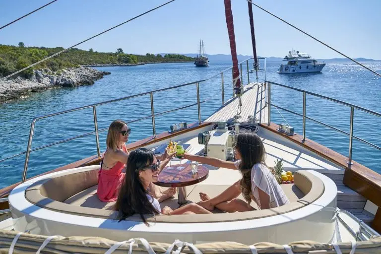 Girls enjoying in cocktails on a cruise in Croatia