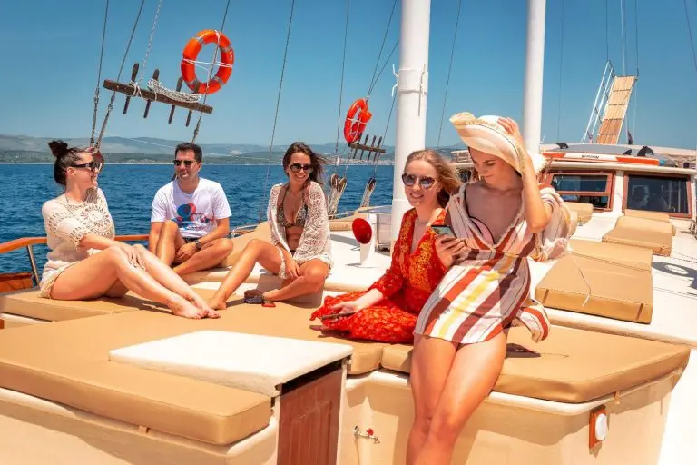 Family sunbathing on a gulet cruise in Croatia